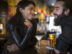 romantic couple having drinks at a pub/bar